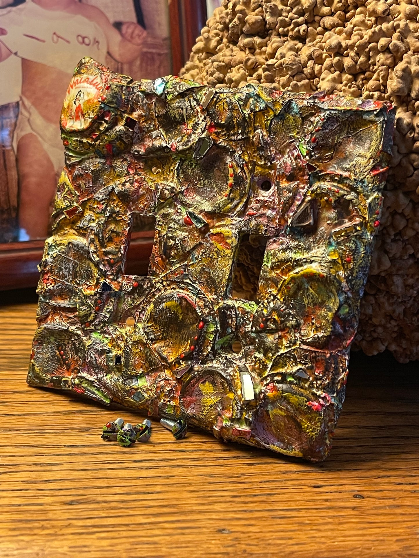 Dented bottle cap covered double toggle light switch cover. Contemporary Industrial chic