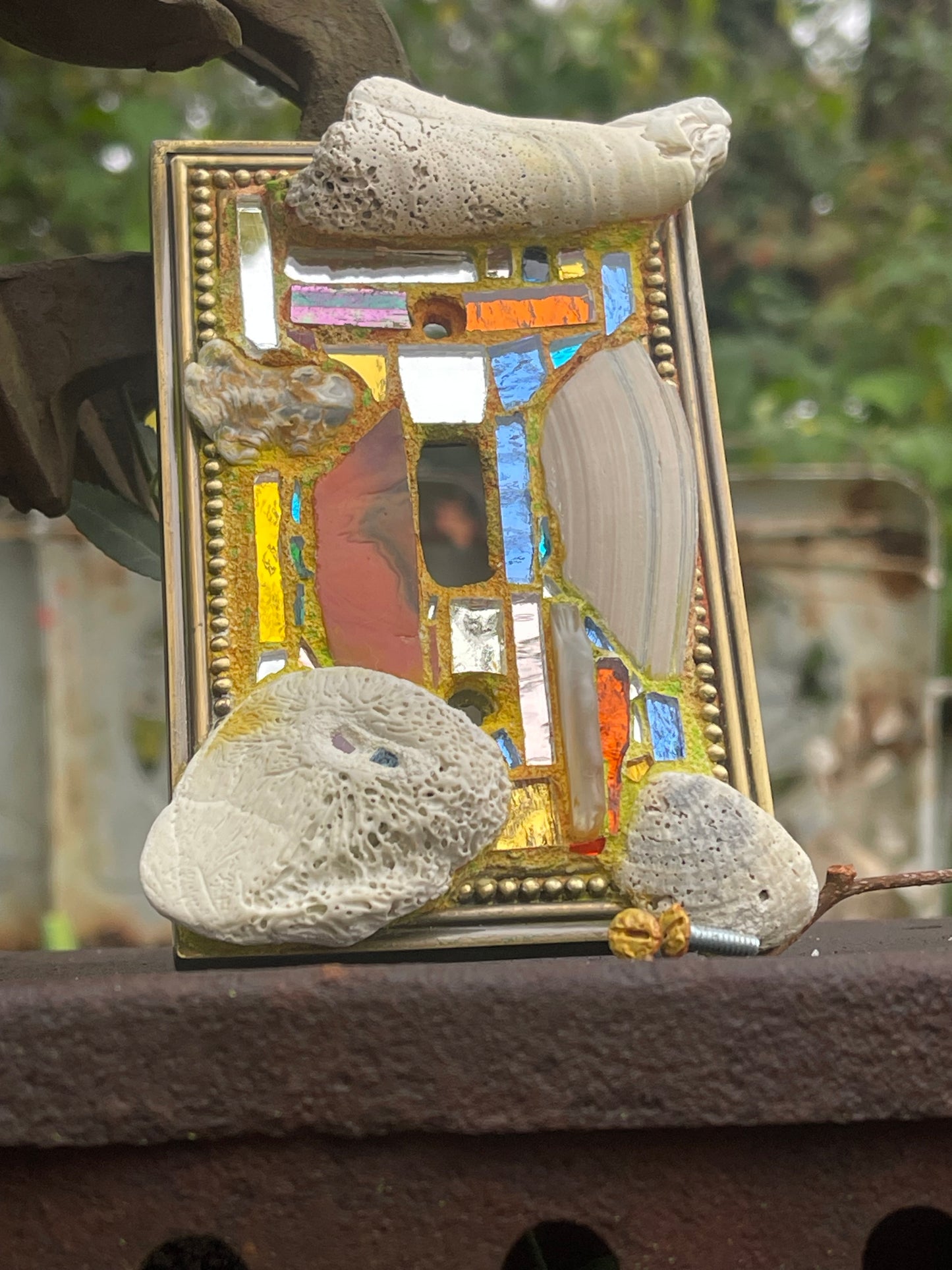 Sea-worn shell and glass mosaic single toggle brass light switch cover