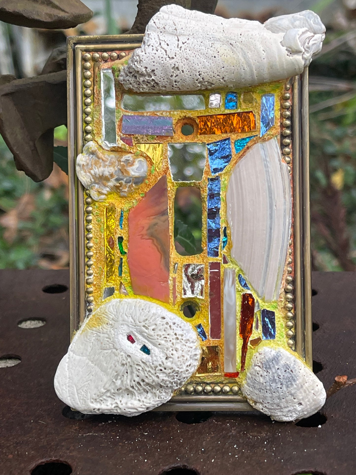 Sea-worn shell and glass mosaic single toggle brass light switch cover