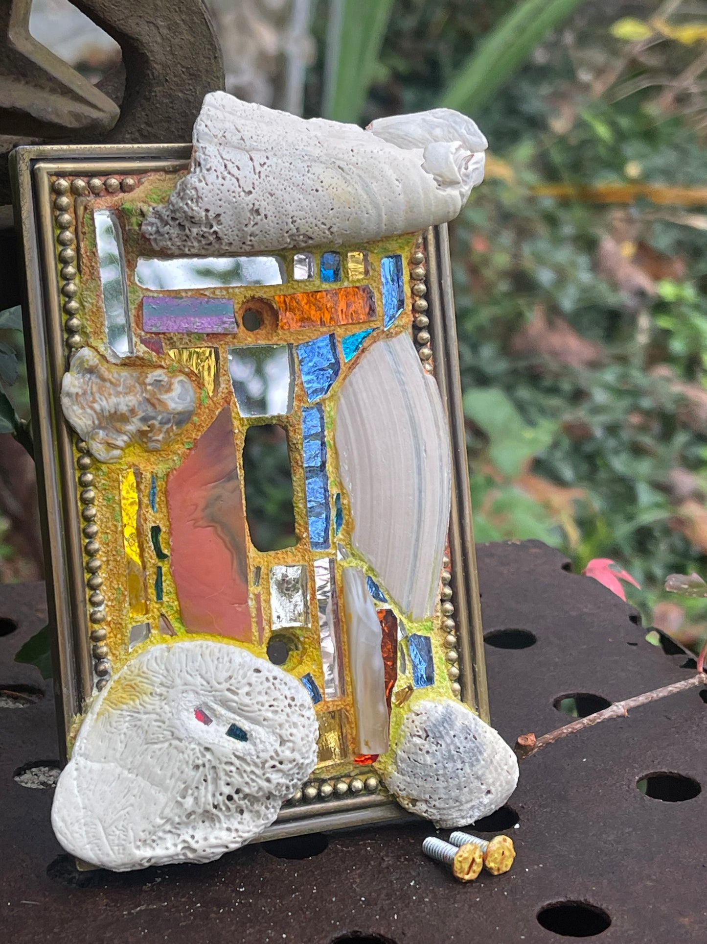 Sea-worn shell and glass mosaic single toggle brass light switch cover