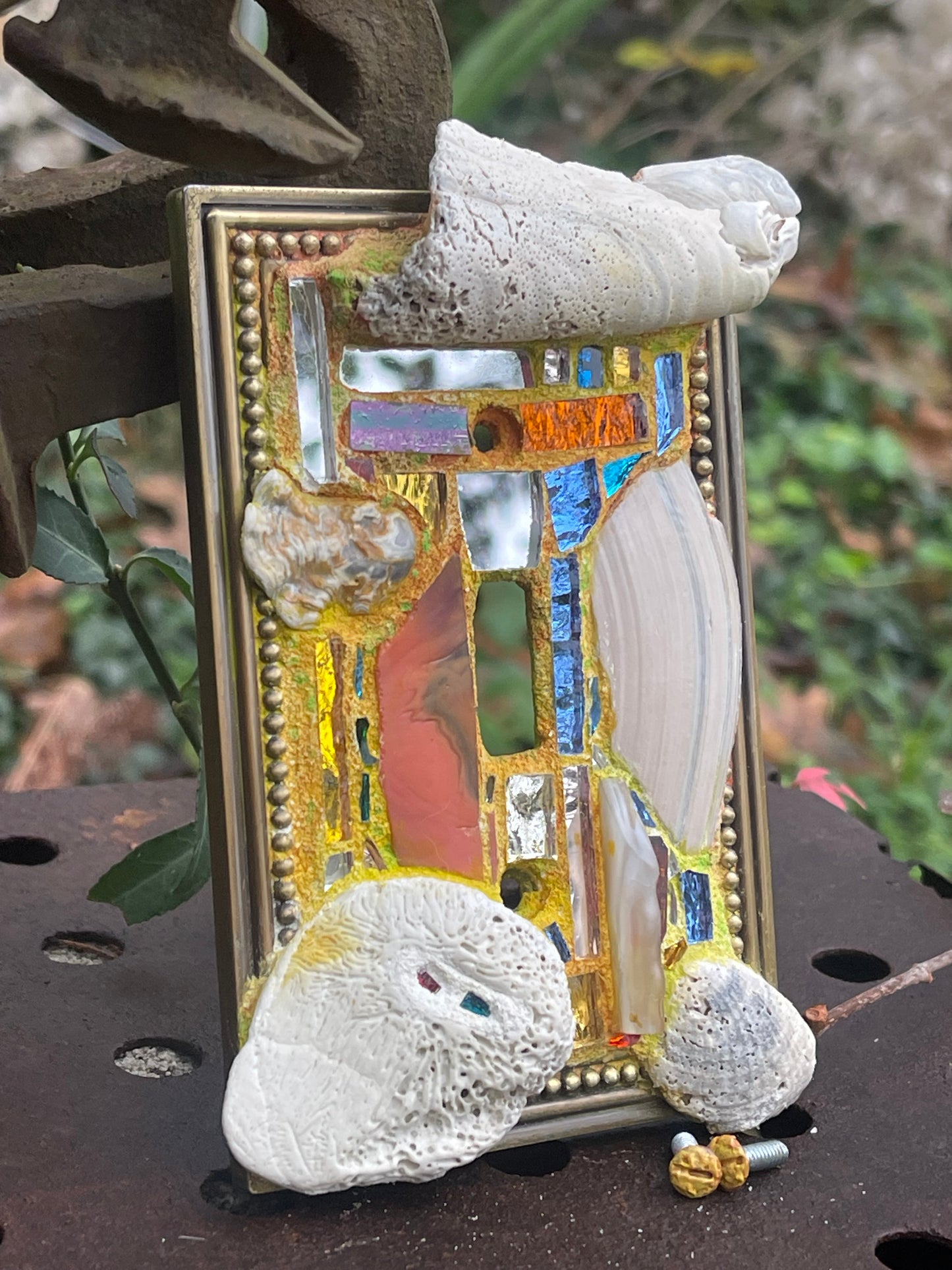 Sea-worn shell and glass mosaic single toggle brass light switch cover