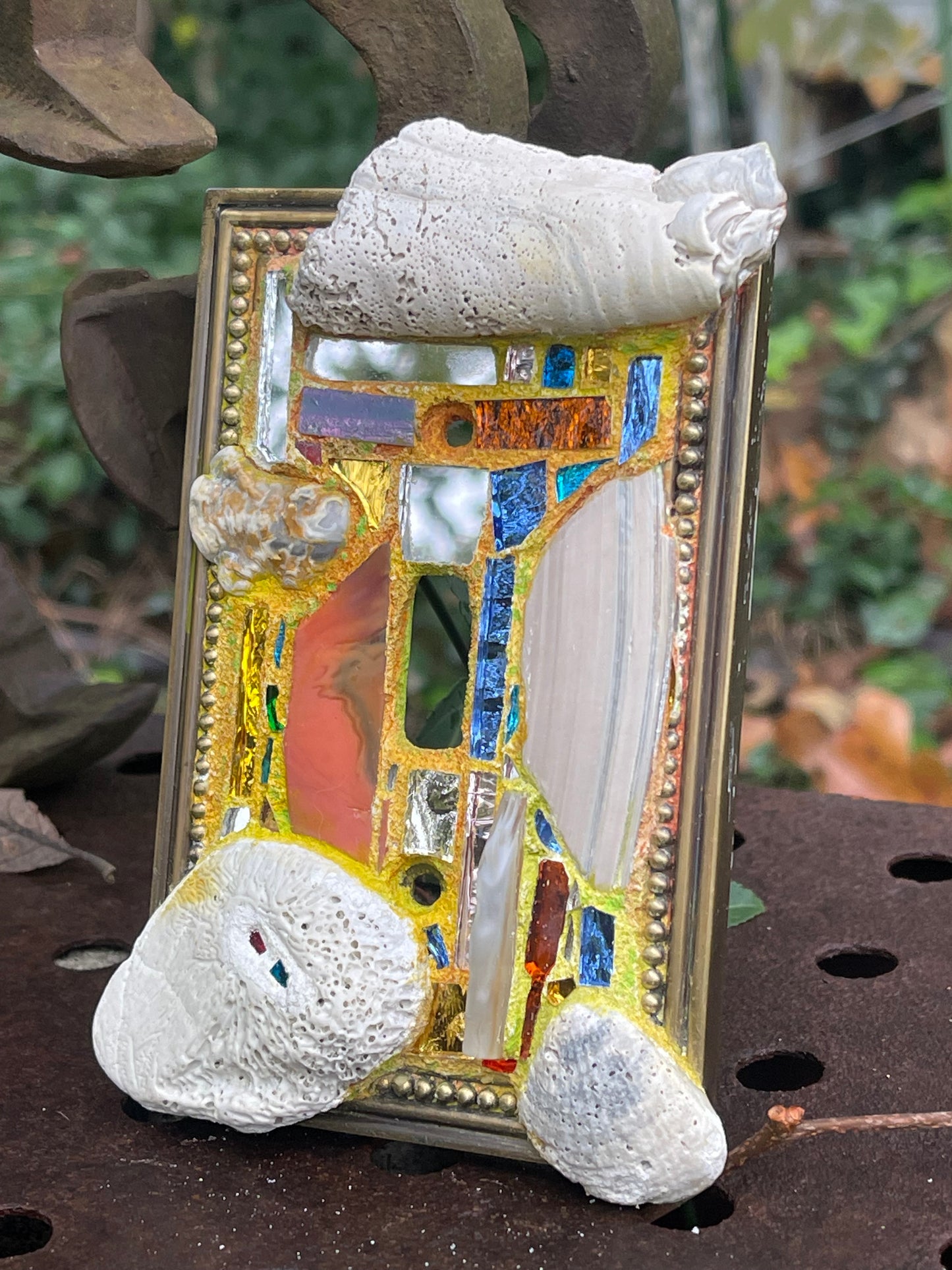 Sea-worn shell and glass mosaic single toggle brass light switch cover
