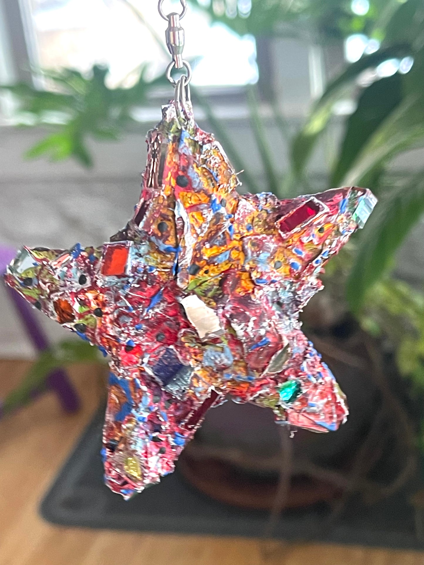 Crunchy sparkly repurposed 4” bottle cap star