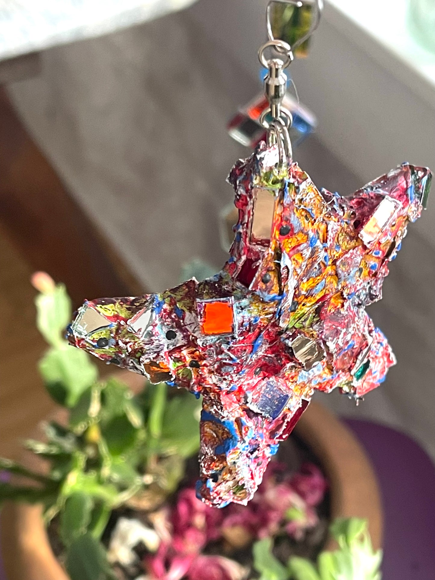Crunchy sparkly repurposed 4” bottle cap star