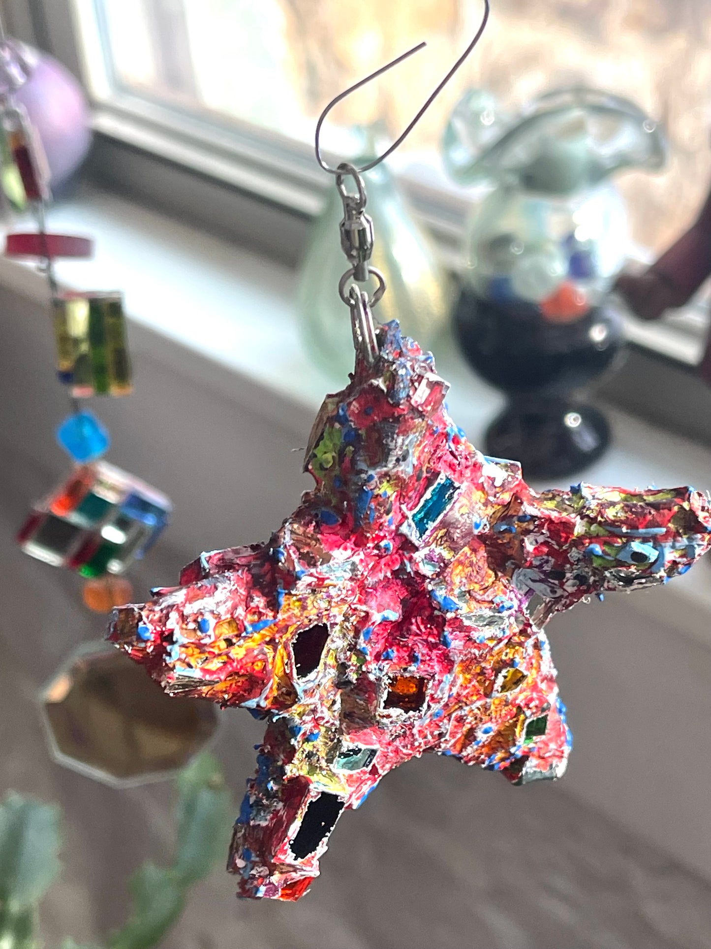 Crunchy sparkly repurposed 4” bottle cap star