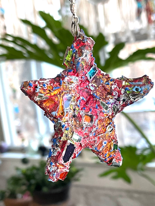 Crunchy sparkly repurposed 4” bottle cap star