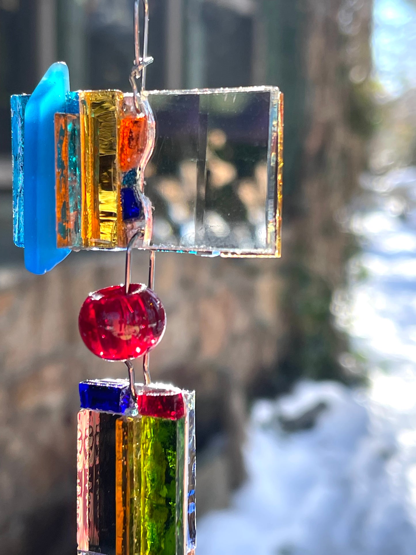 Long 48" mirror mosaic sun chain lots of blue, glowing amber, juicy reds