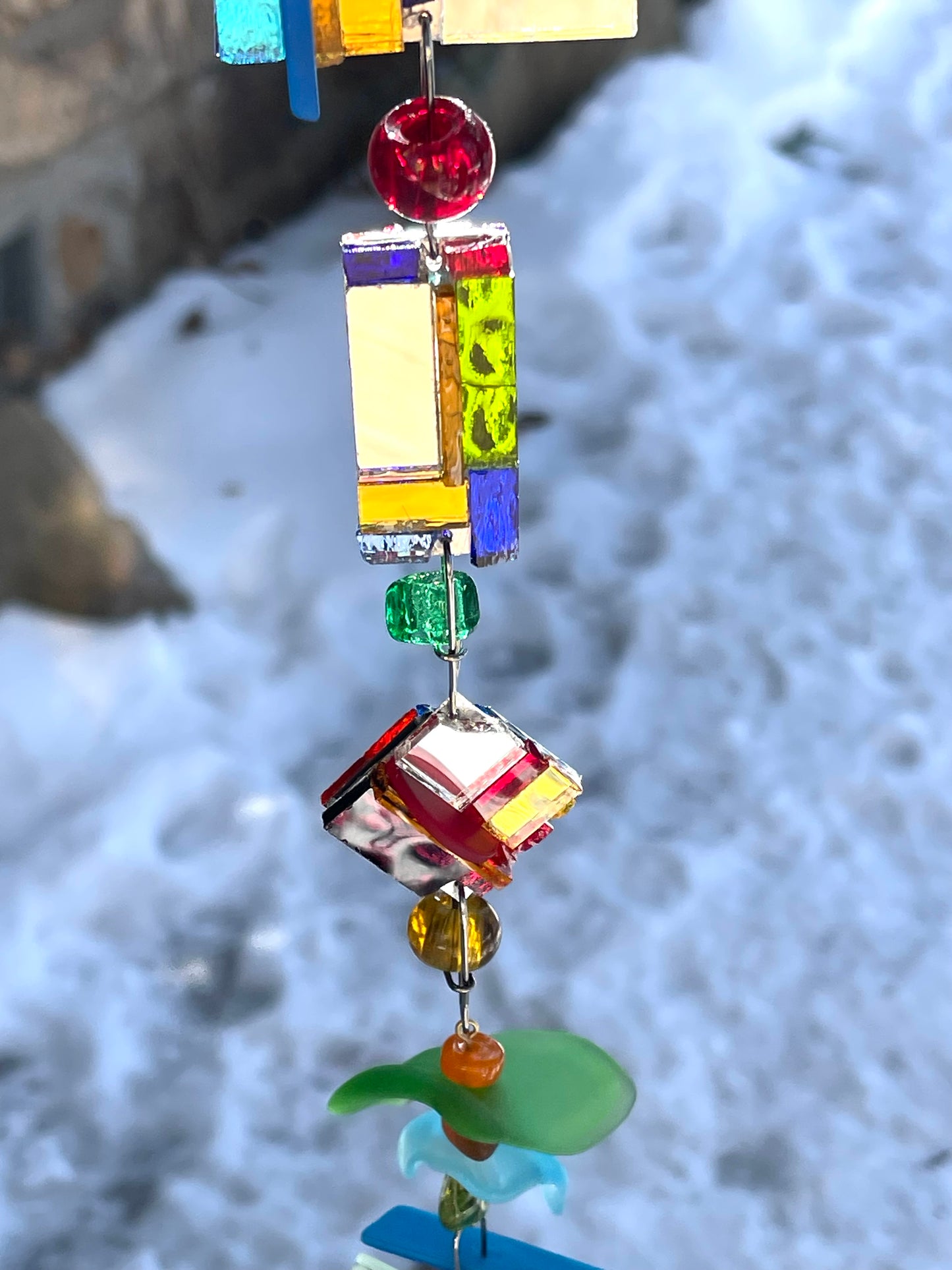 Long 48" mirror mosaic sun chain lots of blue, glowing amber, juicy reds