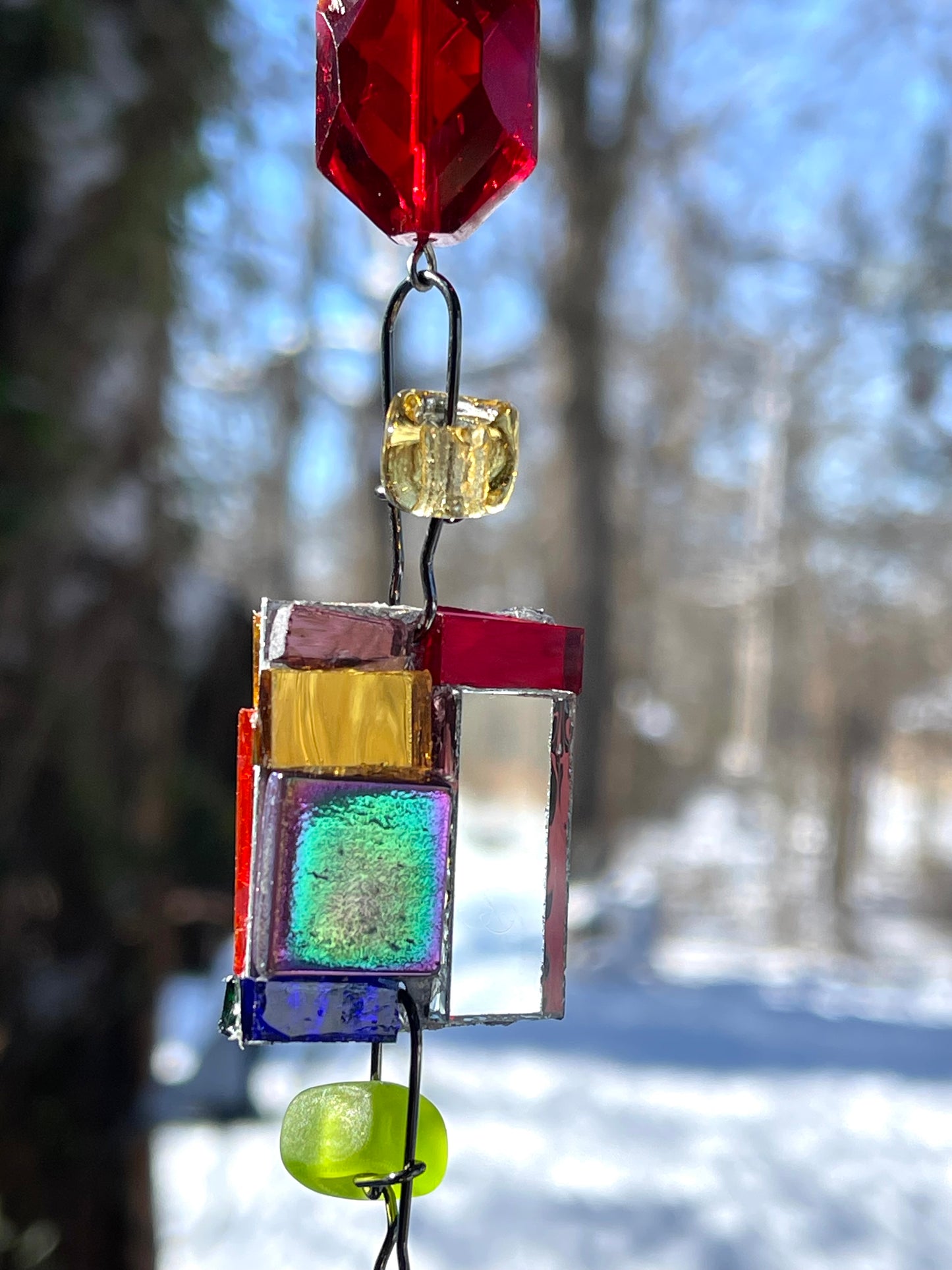 Long 48" mirror mosaic sun chain lots of blue, glowing amber, juicy reds