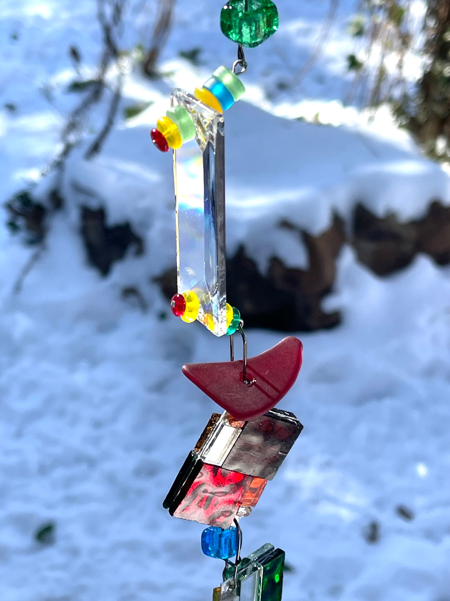 Long 48" mirror mosaic sun chain lots of blue, glowing amber, juicy reds