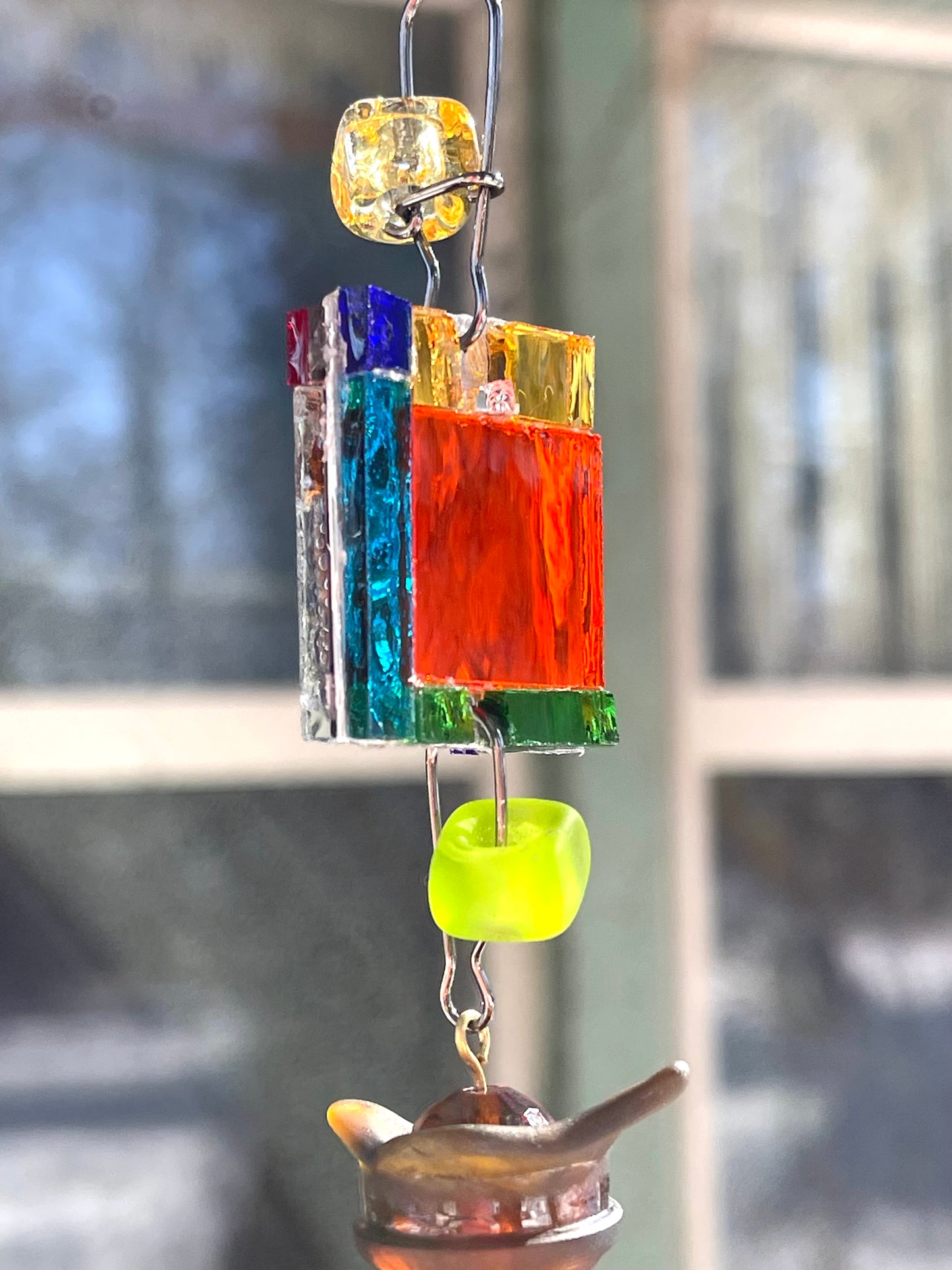 Long 48" mirror mosaic sun chain lots of blue, glowing amber, juicy reds