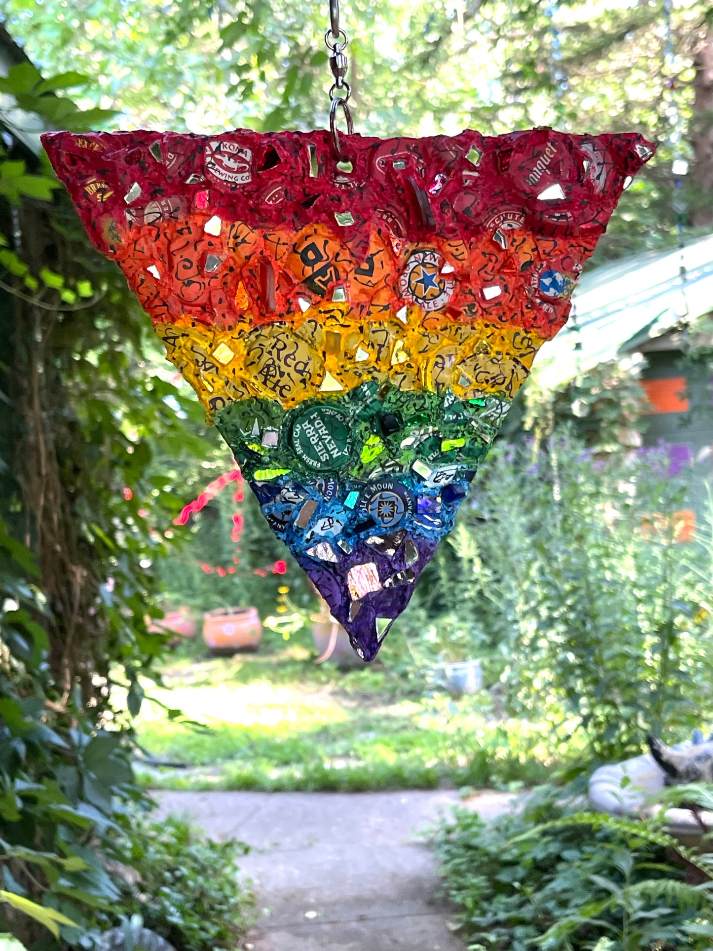 Rainbow pride bottle cap triangle with mirror bits. Glorious!