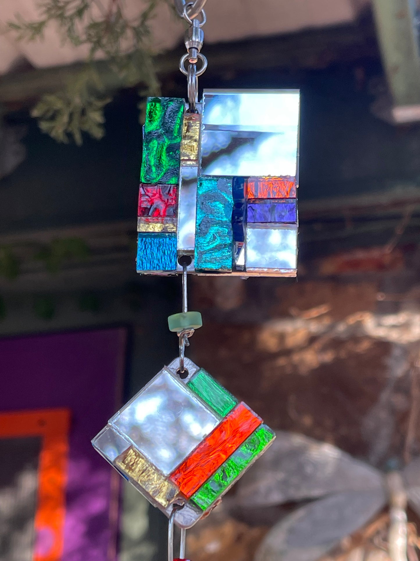 Contemporary 42” long mini mirror mosaic sun chain with colored glass, prism, repurposed bottle throat and glass beads. Dazzling.