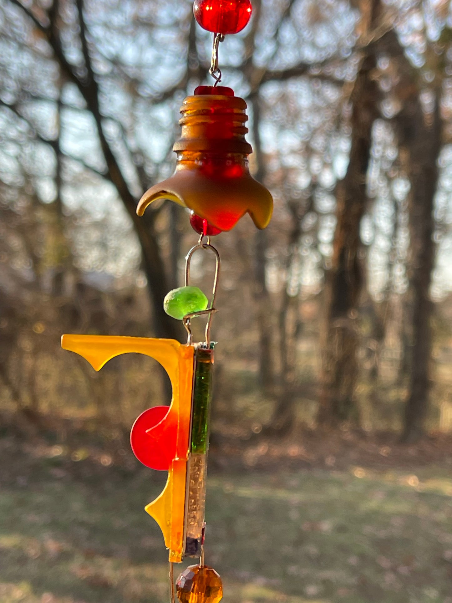 Contemporary 42” long mini mirror mosaic sun chain with colored glass, prism, repurposed bottle throat and glass beads. Dazzling.