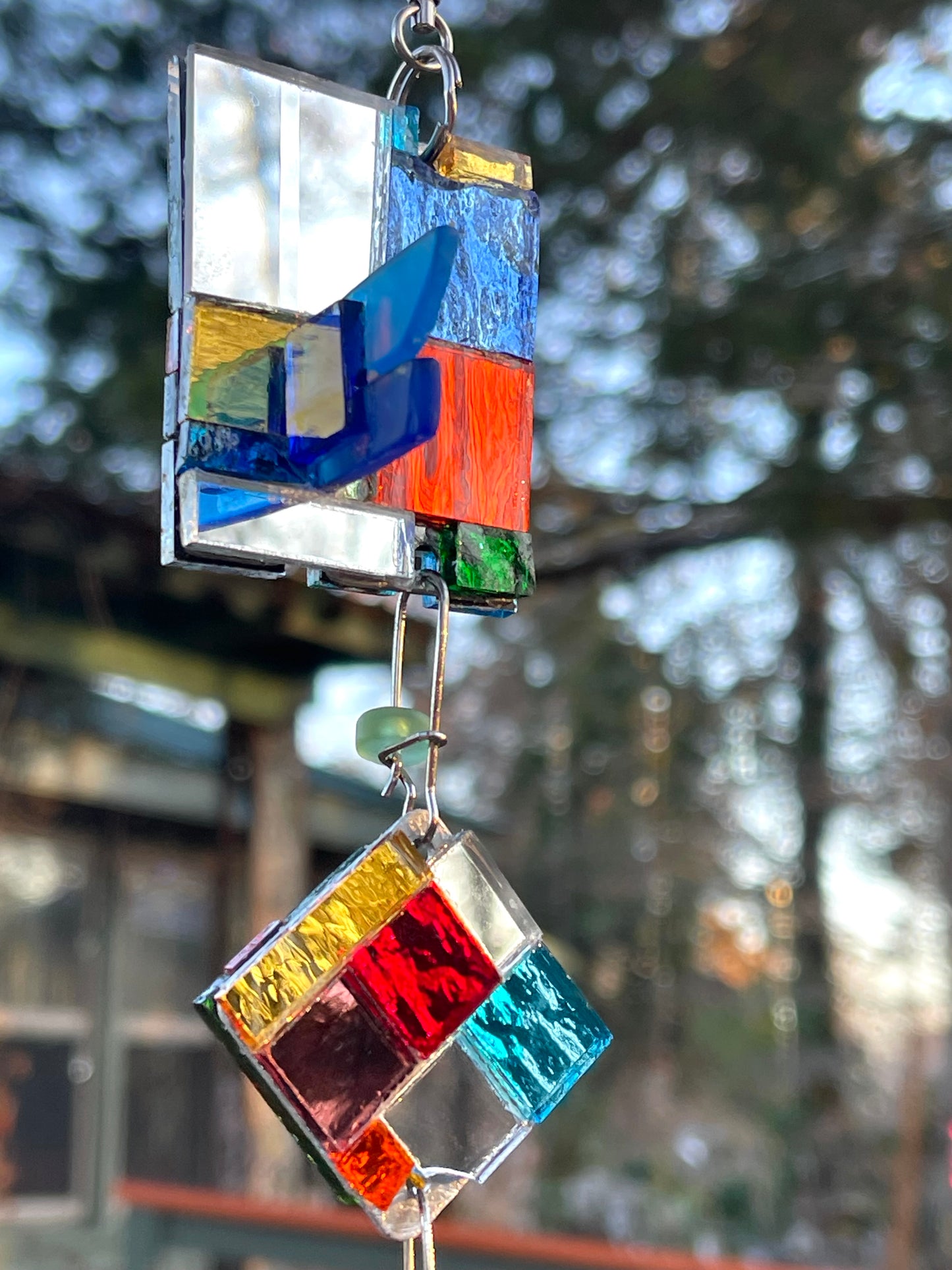 Contemporary 42” long mini mirror mosaic sun chain with colored glass, prism, repurposed bottle throat and glass beads. Dazzling.