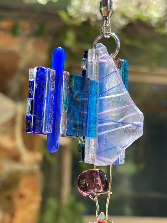 Sparkly mirror mosaic 47” long sun chain, lots of blue, glows and sparkles