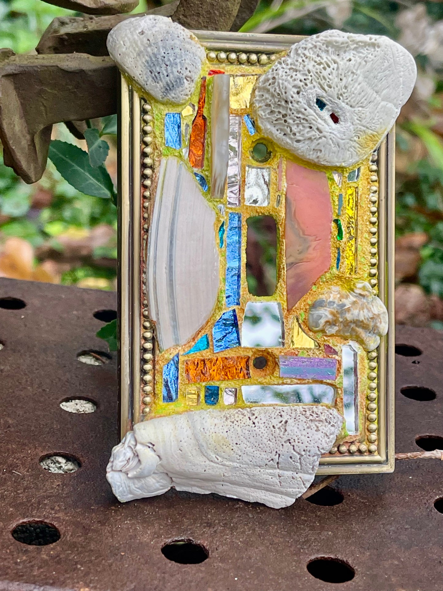 Sea-worn shell and glass mosaic single toggle brass light switch cover