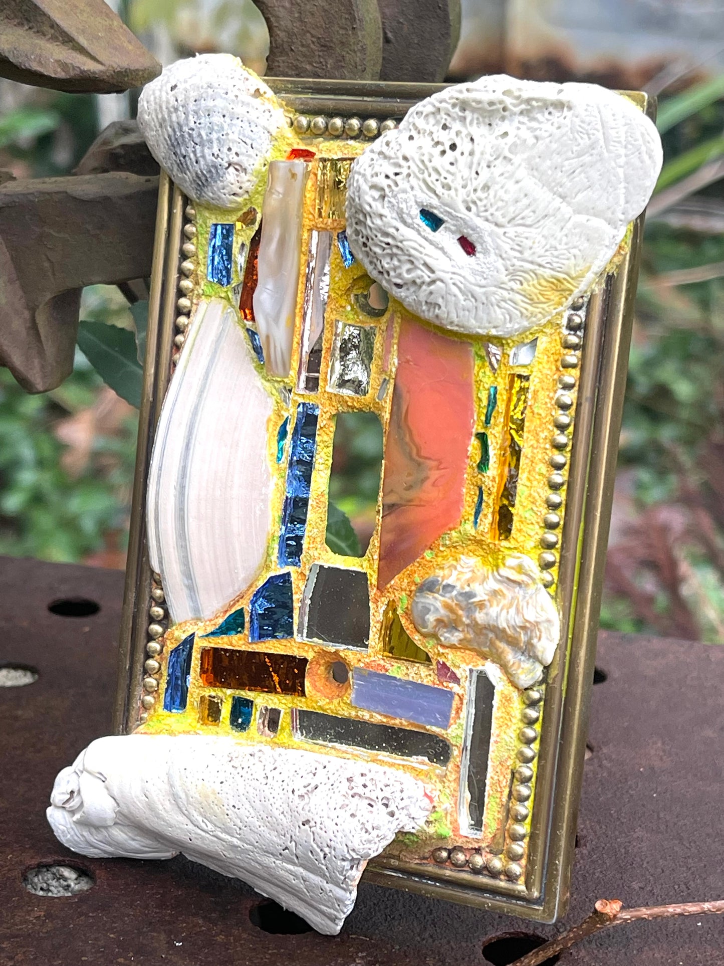 Sea-worn shell and glass mosaic single toggle brass light switch cover