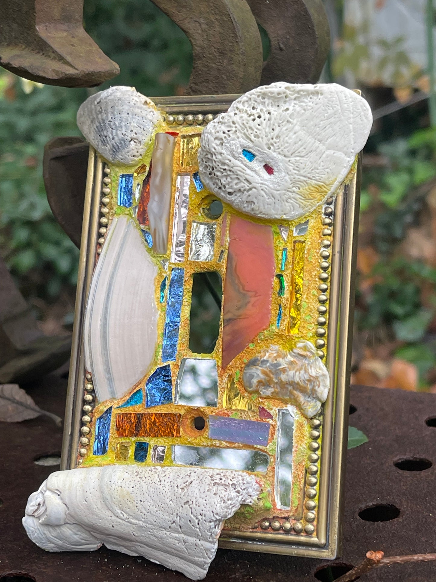 Sea-worn shell and glass mosaic single toggle brass light switch cover